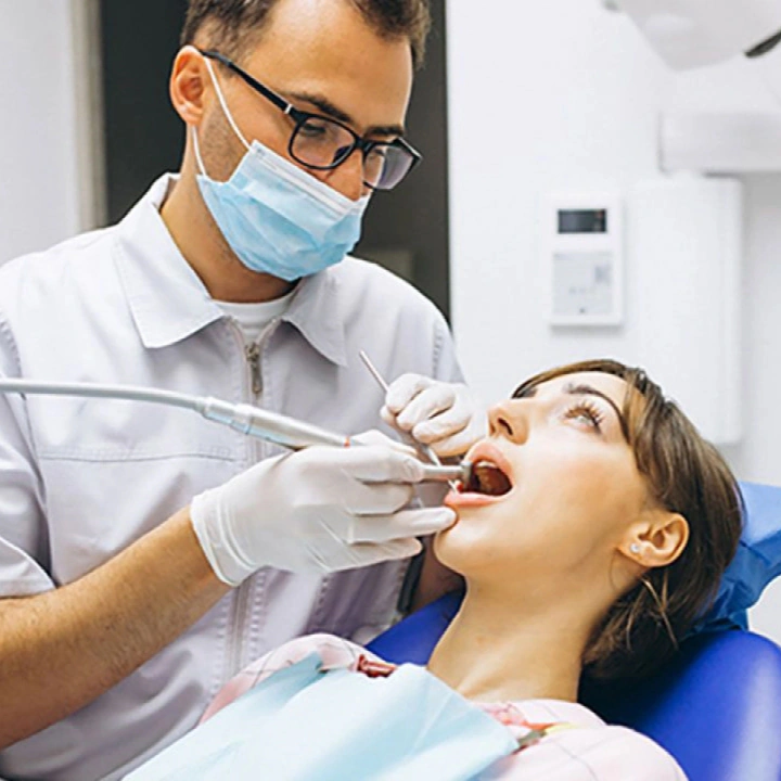 Cosmetic dental bonding treatment to improve tooth appearance